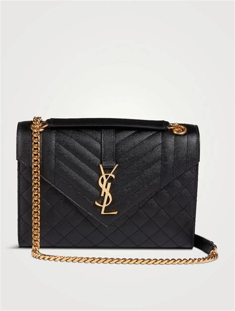 ysl medium monogram pouch|Saint Laurent YSL Monogram Medium Pouch in Smooth Leather.